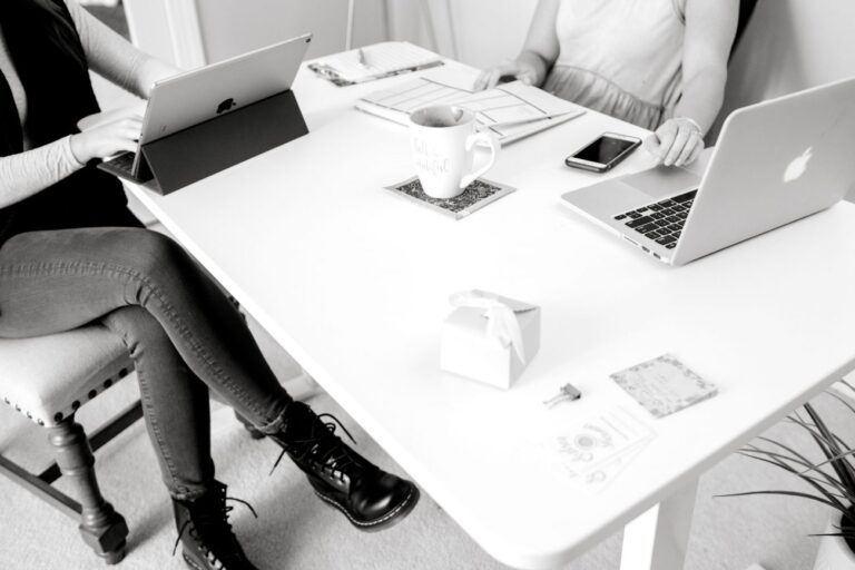 woman sitting at a table learning how to create engaging content