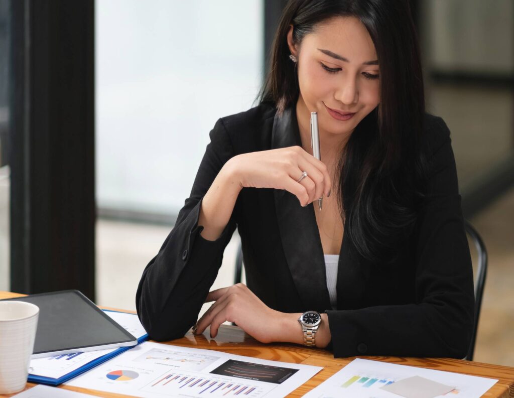 Woman working on recession proof strategies for her business